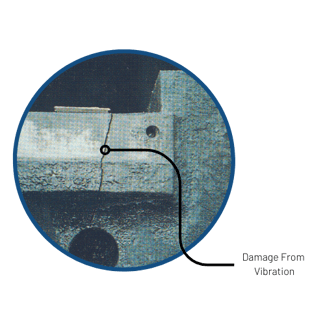 Visible crack in manufacturing machine from excessive vibration.