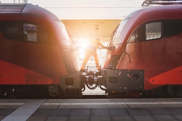 Red Train with engineer in between