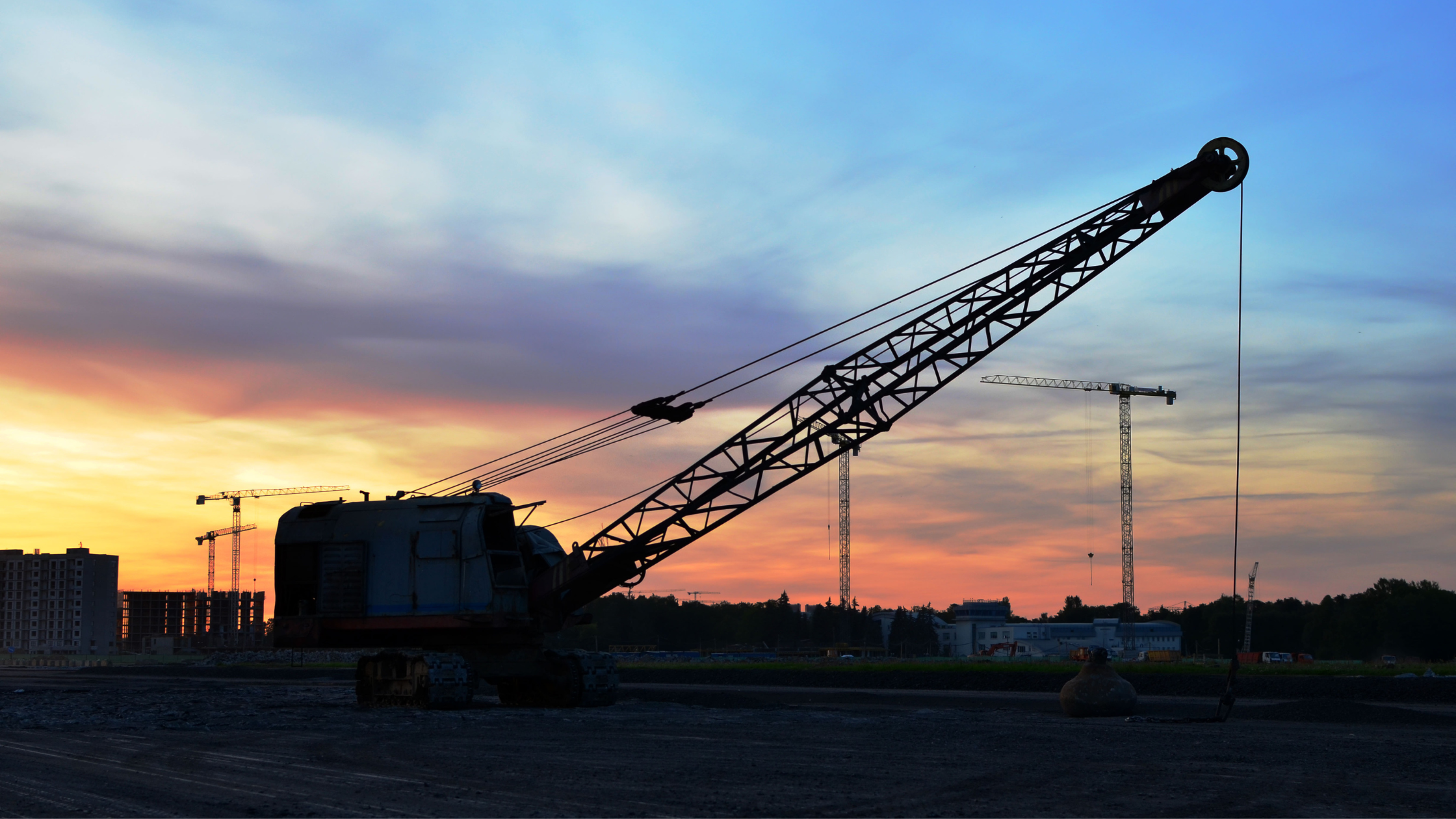 Dragline in front of a sunset